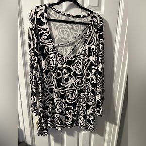 Long sleeve top with criss cross design across neck